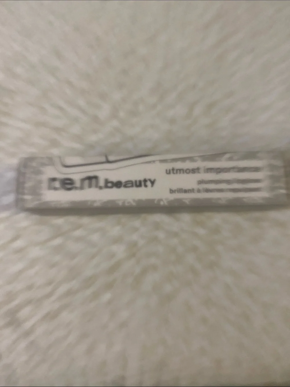 r.e.m. beauty Utmost Importance Lip Gloss - Clear Shimmer